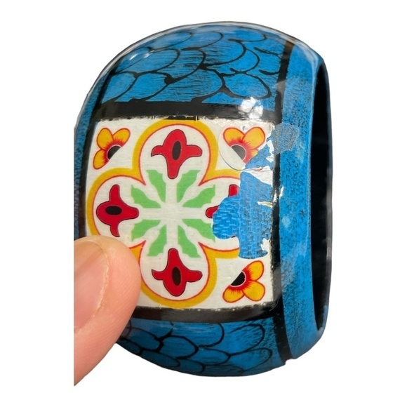 Wooden hand painted bangle. Colors of blue, red, yellow, green, and white. - Picture 7 of 8